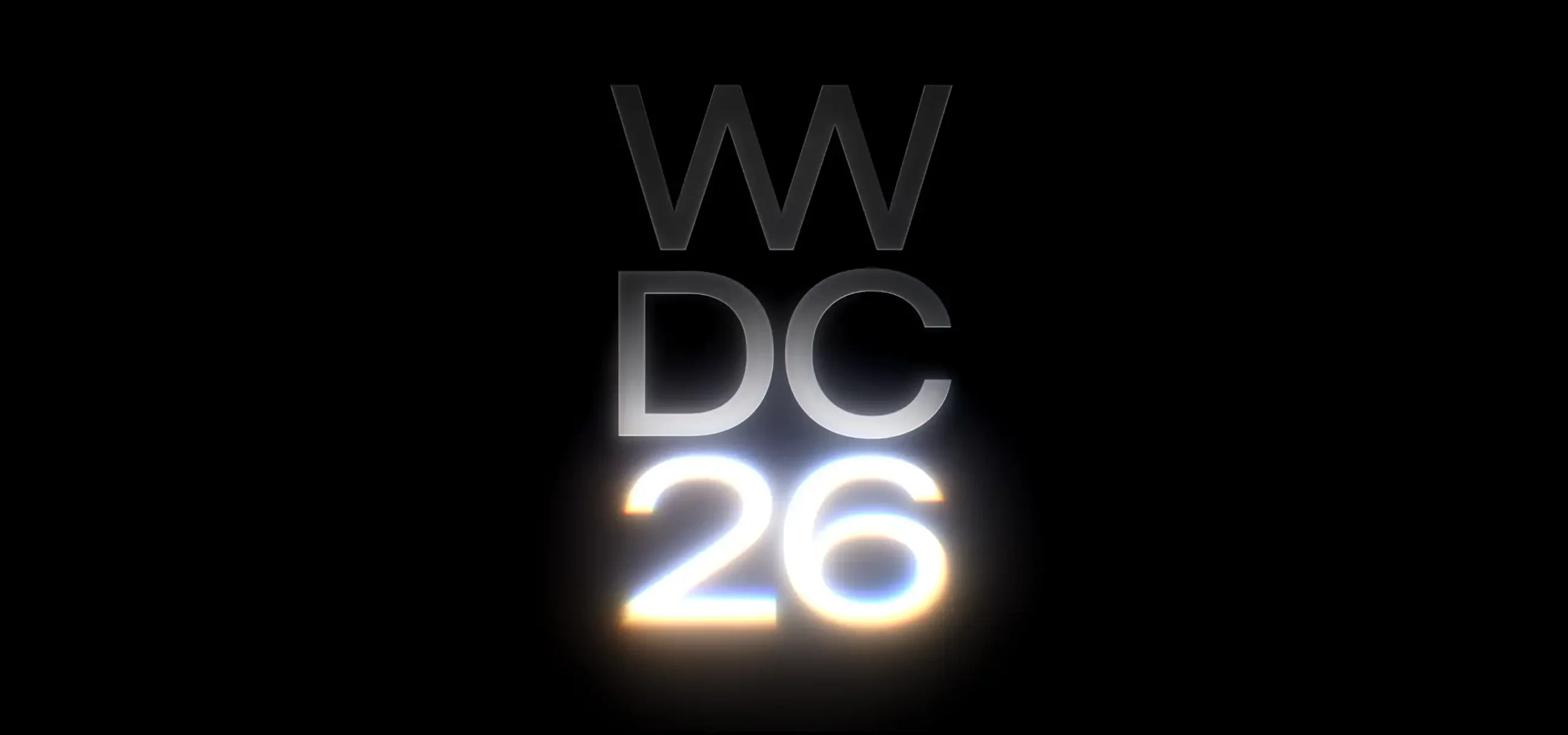 검은색 배경에 흰색과 은색으로 빛나는 WWDC 26 공식 로고 텍스트. 애플의 2026년 연례 개발자 컨퍼런스를 상징함.